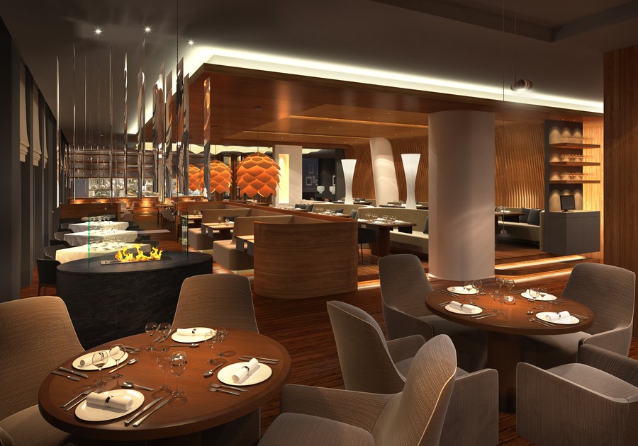 Image is of a modern restaurant with brown and beige furniture.