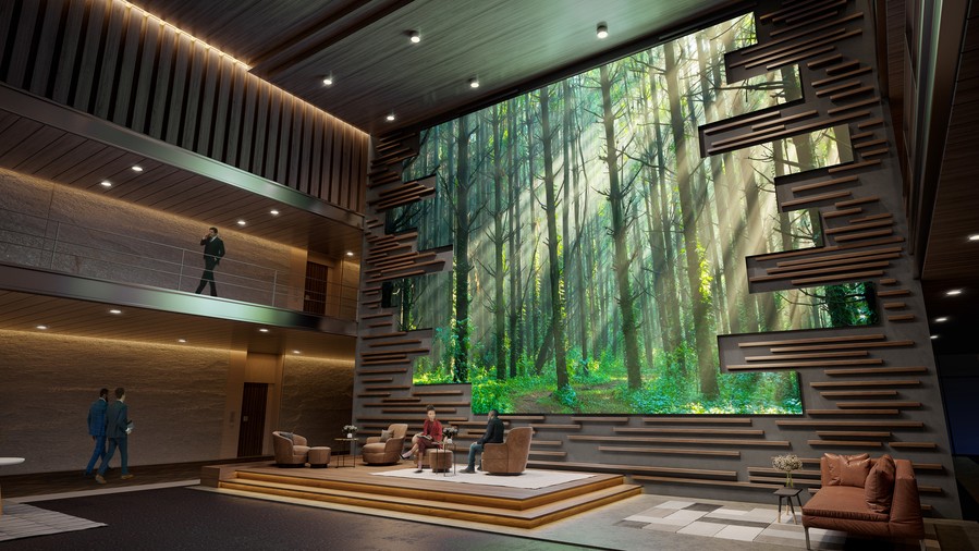 A large video wall displaying sunlight filtering through trees in a business setting.