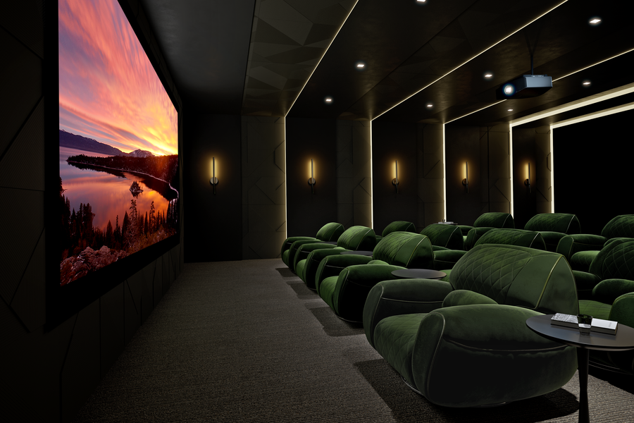 A large home theater with green plush chairs, a large movie screen, and a Sony projector.